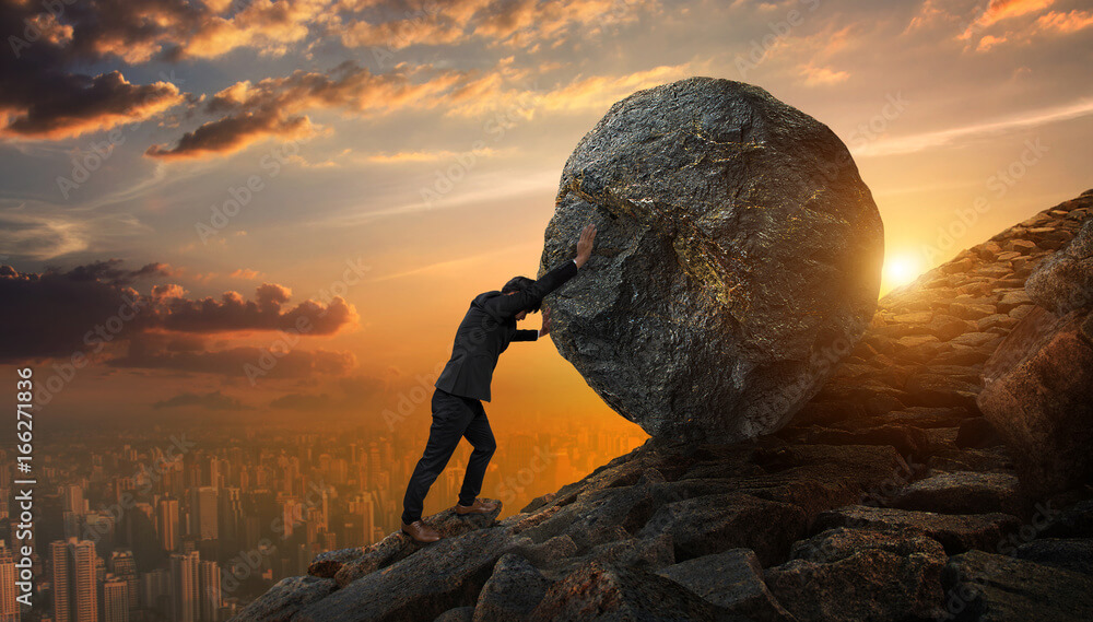 Embrace Minimalism: A Journey from $20,000 Debt to Financial Freedom 7 Business man pushing large stone up to hill , Business heavy tasks and problems concept.